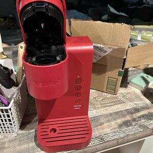 Keurig Red Drinkware with Sleek Design and Compact Form